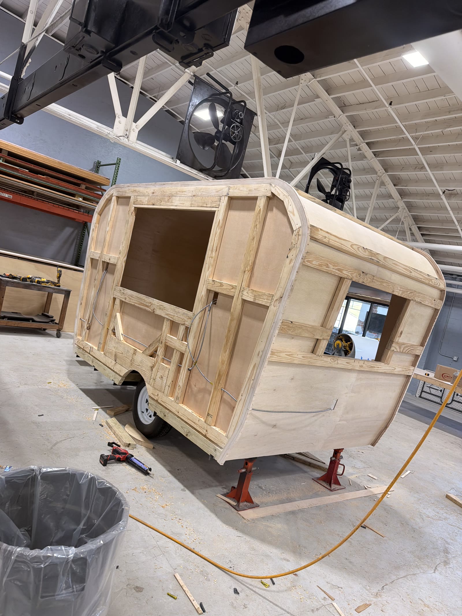 Trailer wood framing in the shop — canned-ham shell